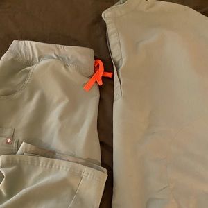 Seafoam/teal figs scrubs.